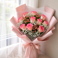 10 pink and white roses with pink berries and white filler flowers bouquet