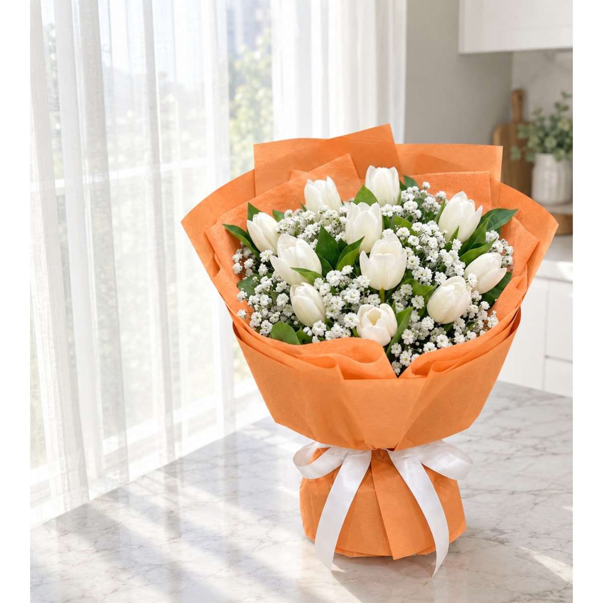 11 white tulip bouquet with Baby’s Breath and orange wrapping